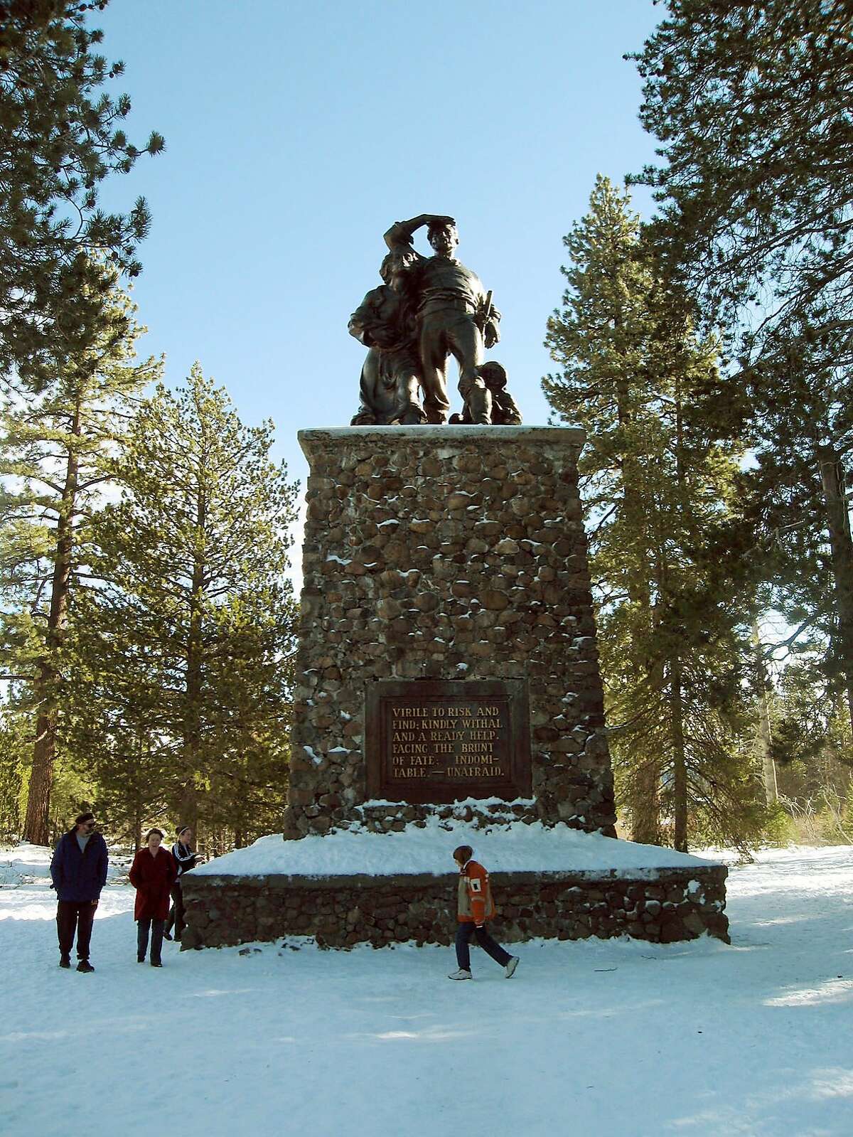 File - In this Jan. 2, 2007, file photo, visitors look at a monument depicting pioneers at Donner Memorial State Park, near Truckee, Calif. California parks officials say Gov. Jerry Brown's new budget proposal would make it possible to nearly double the operating hours planned at a new visitor's center and museum at Donner Memorial State Park north of Lake Tahoe. The center is scheduled to open in late spring 2015 along U.S. Interstate 80 near Truckee. (AP Photo/San Francisco Chronicle, John Flinn, File) ORTHERN CALIFORNIA OUT; MANDATORY CREDIT PHOTOG & CHRONICLE; MAGS OUT; NO SALES