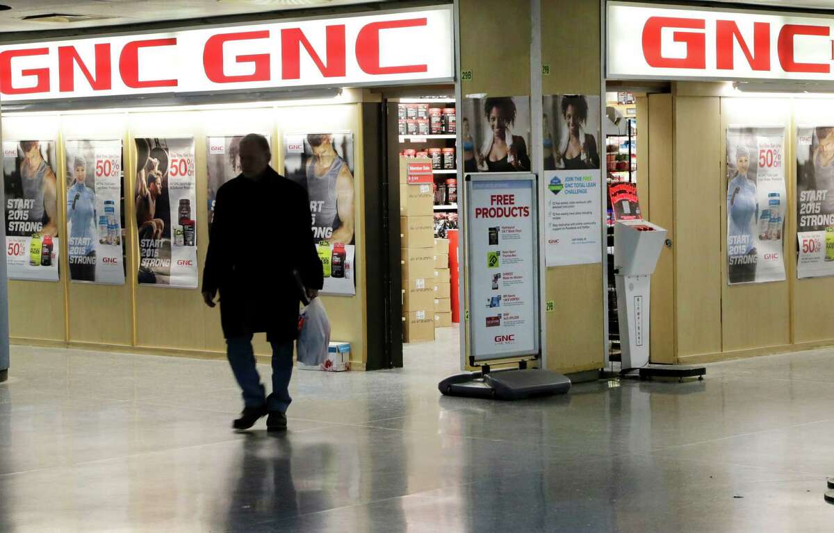 A man leaves a GNC store, Tuesday, Feb. 3, 2015 in New York. Numerous store brand supplements aren?’t what their labels claim to be, an ongoing investigation of popular herbal supplements subjected to DNA testing has found, New York Attorney General Eric Schneiderman said Tuesday. GNC, Target, Walmart and Walgreen Co. sold supplements that either couldn?’t be verified to contain the labeled substance or that contained ingredients not listed on the label, according to Schneiderman's office. ?“We stand by the quality, purity and potency of all ingredients listed on the labels of our private label products,?” said GNC spokeswoman Laura Brophy. (AP Photo/Mark Lennihan) ORG XMIT: NYML102