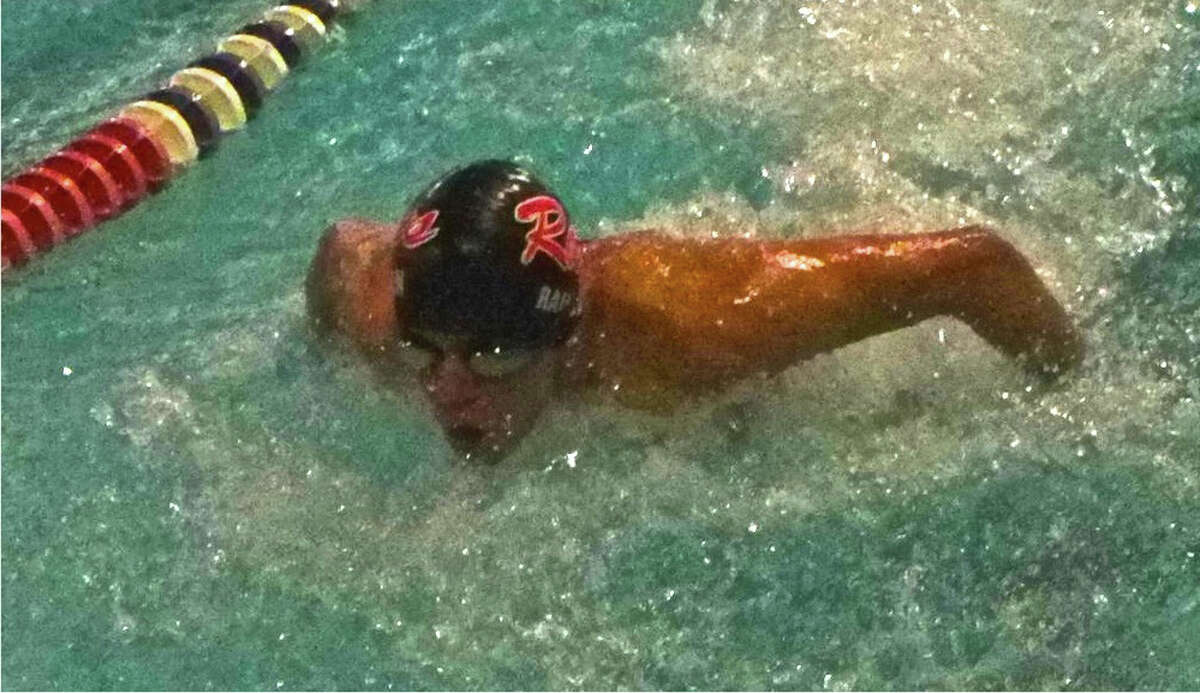 Brandon Rambaran swimming butterfly.