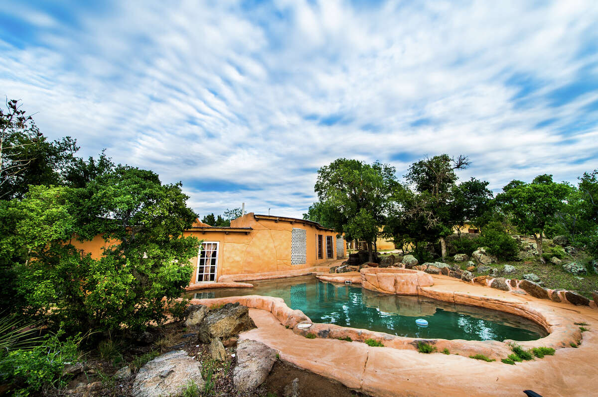 Trois Estate at Enchanted Rock, an almost 40-acre development located across from the popular state park, has been put up for sale for $18 million. The Hill Country commerical property, listed by Mike Hermes at Reliance Residential Realty, was built in 2006 and features roughly 80,000 square feet within its 16 buildings, which include a bed and breakfast, individual casitas, chapel, restaurant and underground grotto among others.