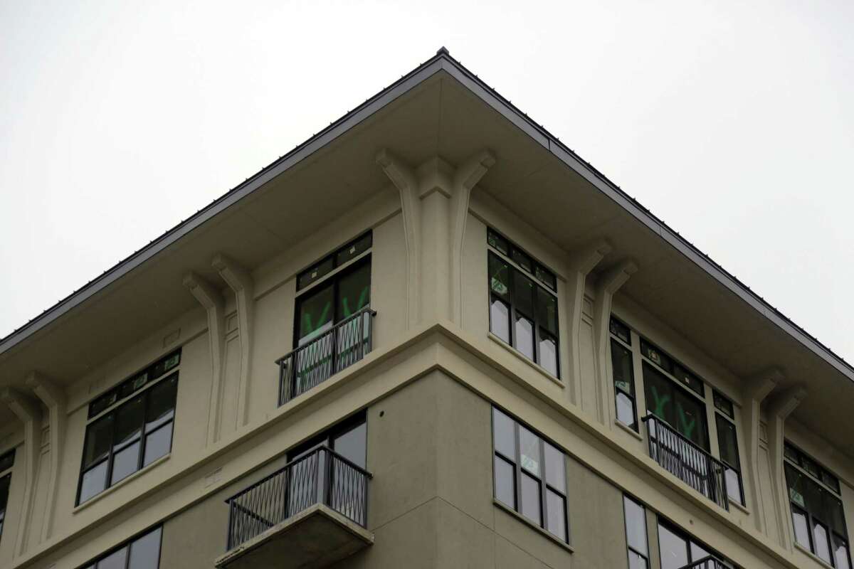 Developer opens luxury apartments as market likely to slow