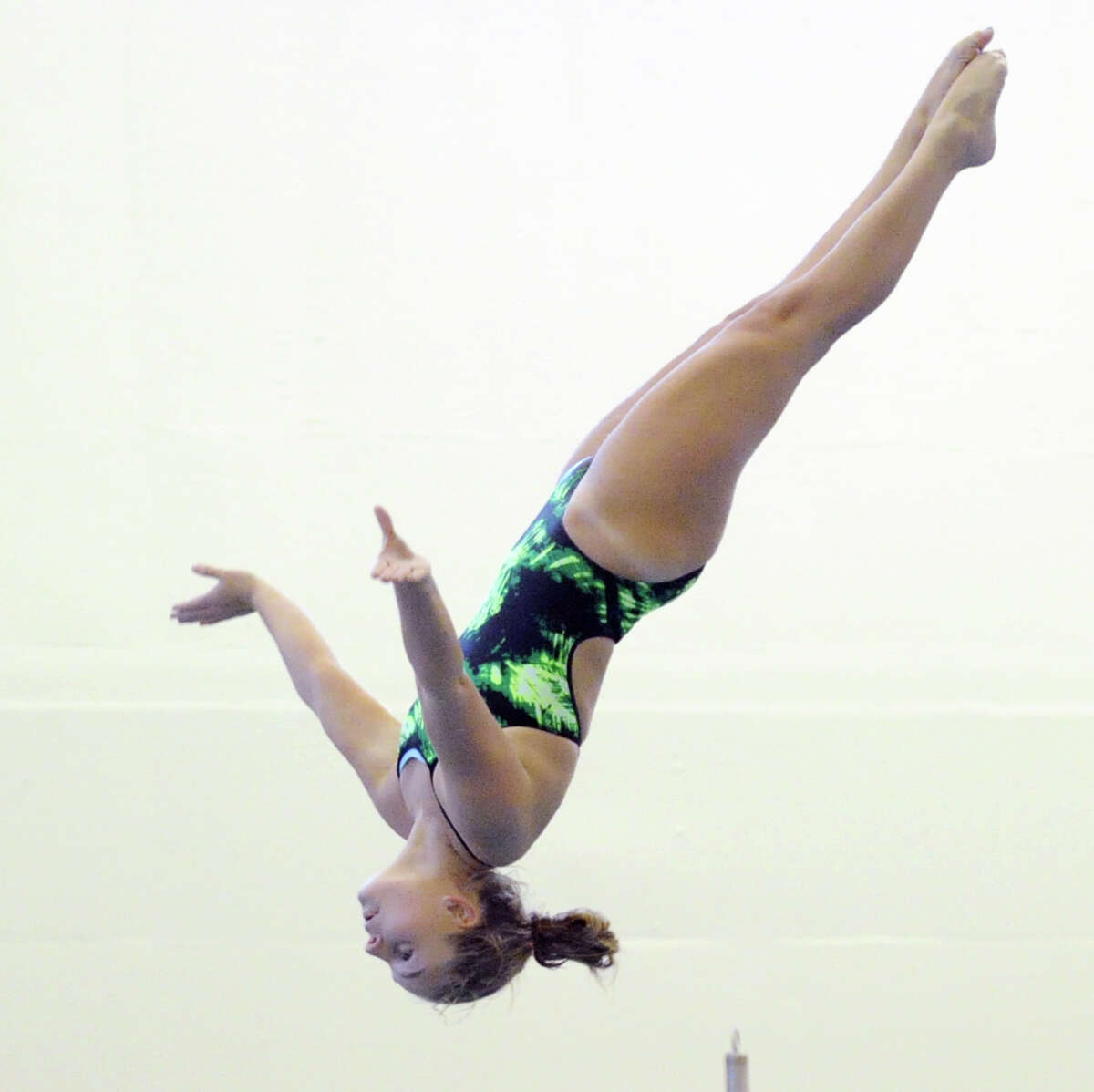 Elizabeth Fitzpatrick of Greenwich Academy competes in the diving during the girls high school swimming meet between Greenwich Academy and Convent of the Sacred Heart at the Brunswick School in Greenwich, Conn., Wednesday, Feb. 4, 2015.