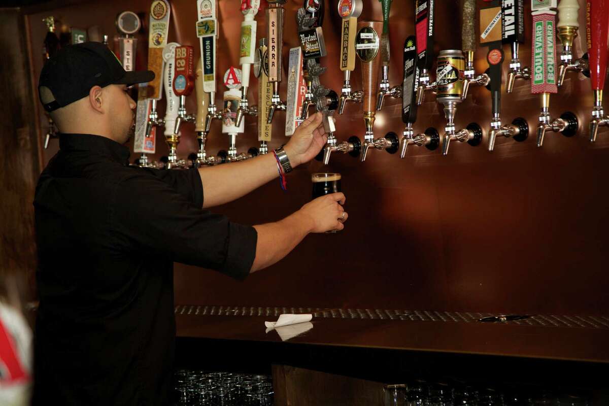 Joshua Sotello is working the bar at the Hoppy Monk.