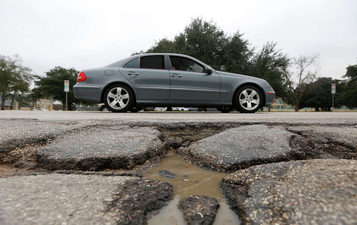 Mayor Annise Parker says the policy of prioritizing big road repairs has left the city struggling to make short-term fixes on potholes, such as this one on Westheimer near Eastside Street.