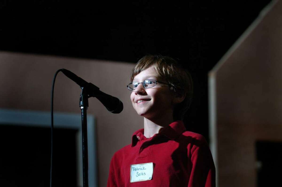Patrick Salts, a Riverfield School student, smiles broadly after winning Fairfield's townwide spelling bee , sponsored by the Junior Women's Club of Fairfield, Thursday Feb. 25, 2010 at Roger Ludlowe Middle School.