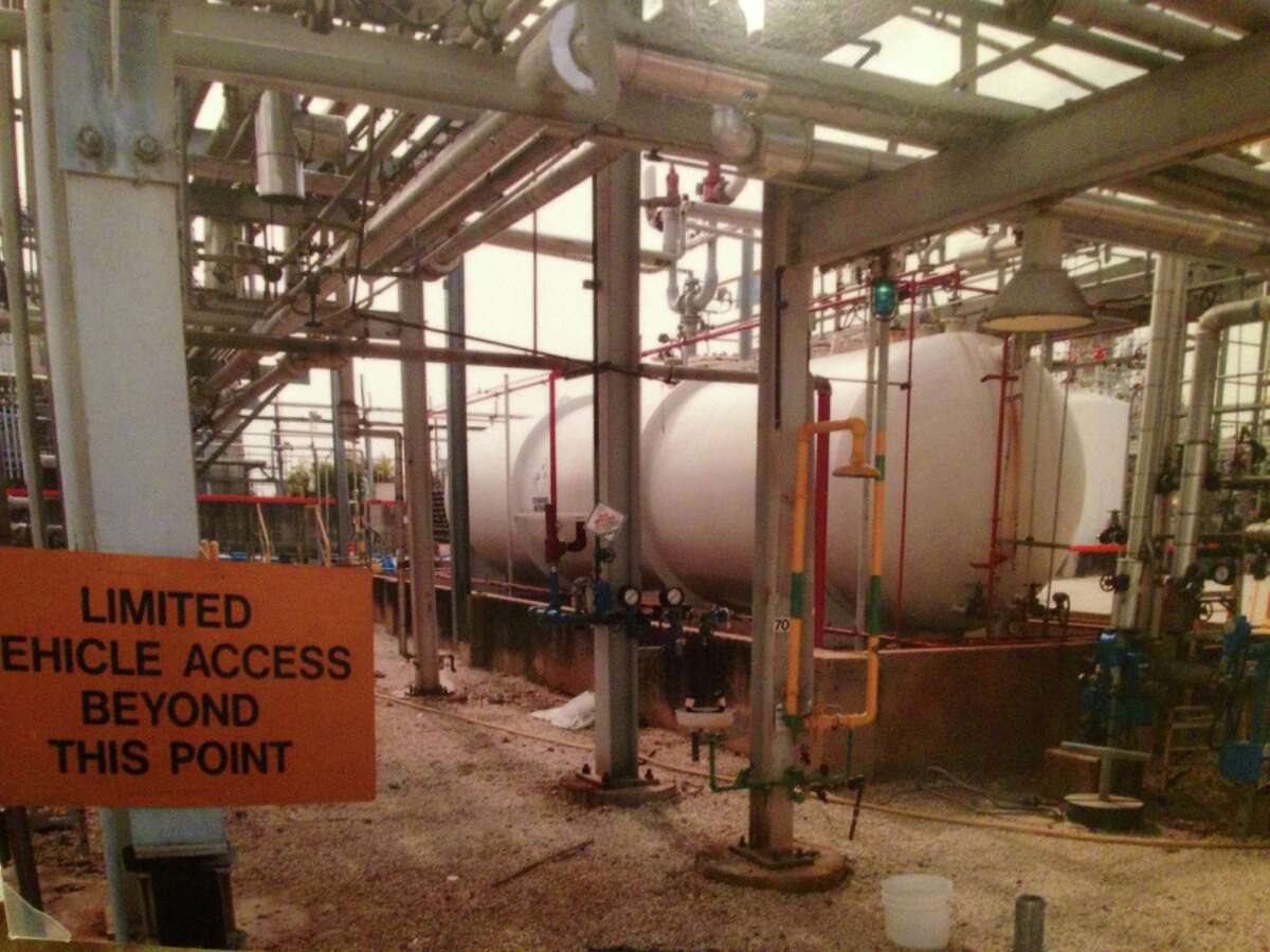 Toxic methyl mercaptan, stored as a liquid in this tank at DuPont's La Porte plant, backed up inside the building and emerged as a gas.