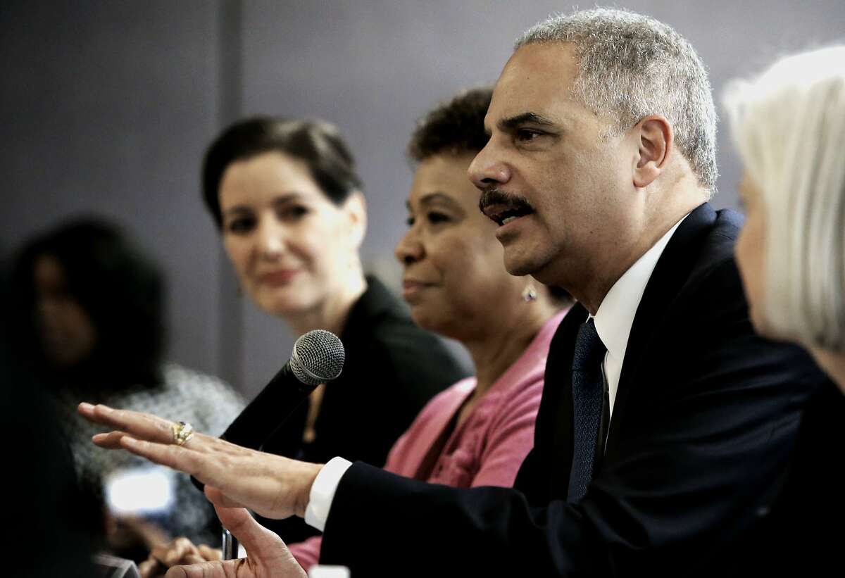 Oakland Mayor Libby Schaaf, (left) and Congresswoman Barbara Lee join U.S. Attorney General Eric Holder and U.S. Attorney Melinda Haag, (right) as he meets with local politicians and community leaders for a round table discussion about improving relationships between law enforcement and communities, at the Ron Dellums Federal Building in Oakland, Ca., on Thursday Feb. 5, 2015.