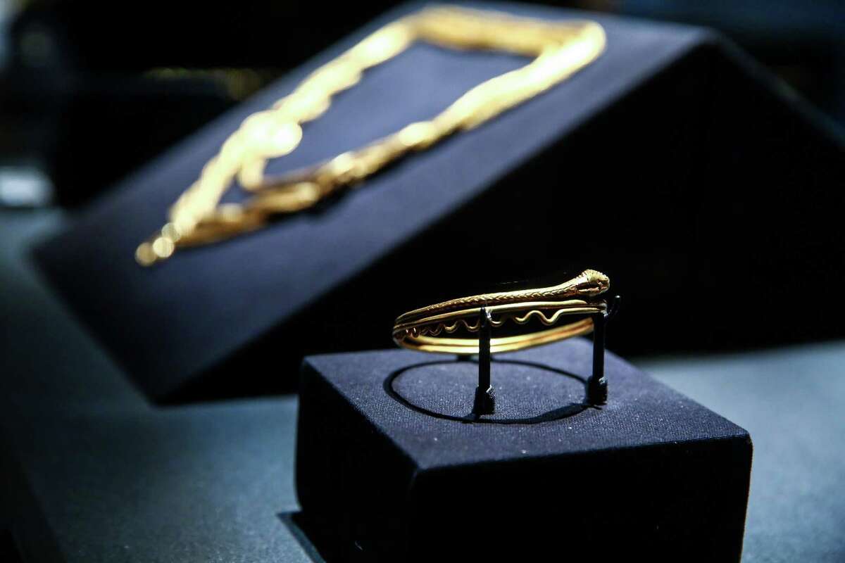 A gold snake bracelet is shown during a press preview of POMPEII: The Exhibition at the Pacific Science Center on Thursday, February 5, 2015. The exhibit brings artifacts from the city that was covered with ash after an eruption of Mount Vesuvius 2,000 years ago.
