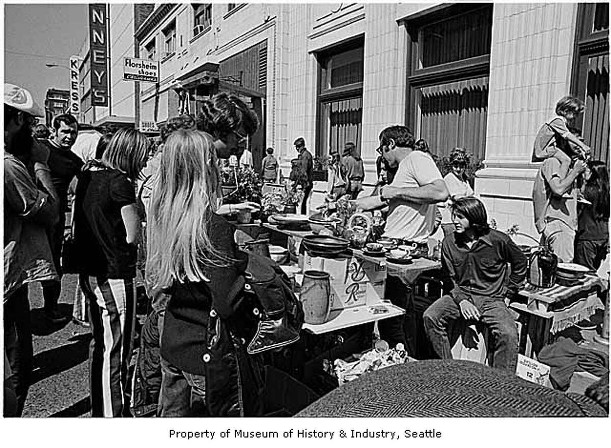 MOHAI caption: Pottery booth at University District street fair, Seattle, 1971