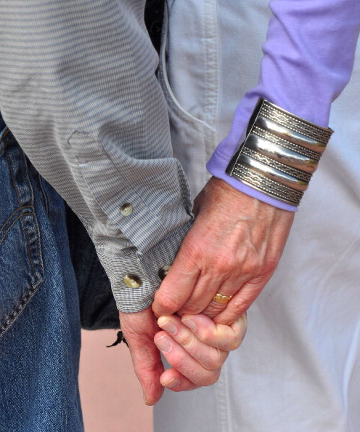 24. Santa Fe, New Mexico This photo shows a senior couple hold hands at an outdoor concert in Santa Fe, New Mexico on Sept. 23, 2012.