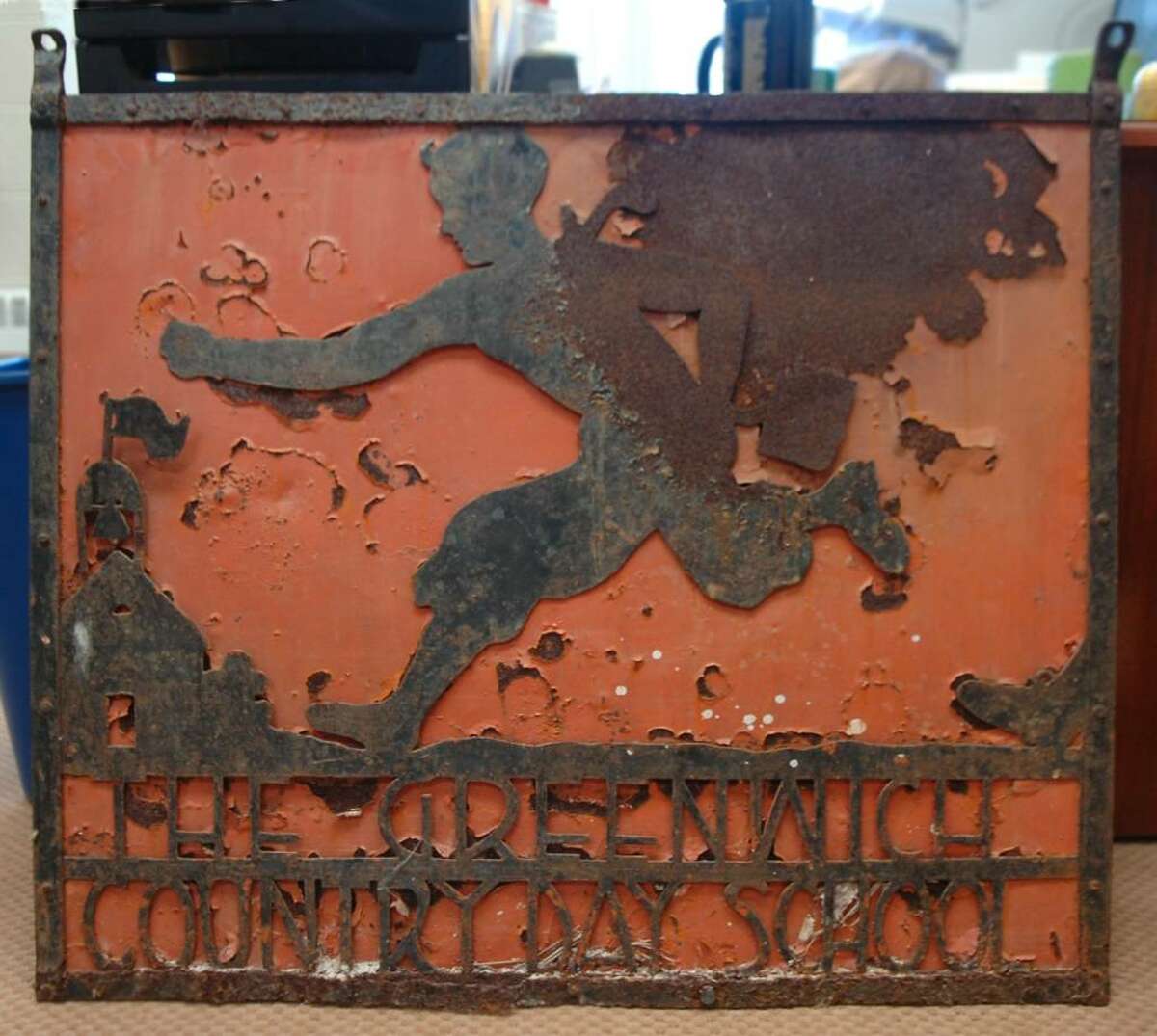 A sign from Greenwich Country Day School, was taken from the school 50 years ago. An anonymous client of Attorney Phil Russell took the sign, and it is being returned to the school by Russell on Monday, March 1, 2010.