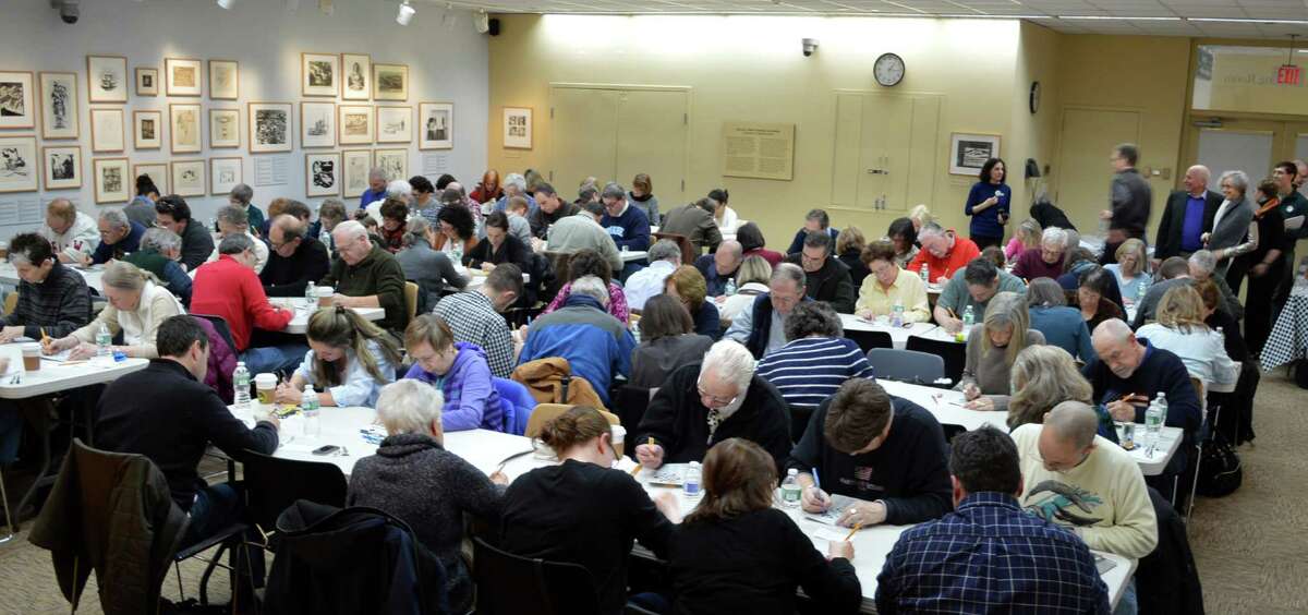 A crowd of more than 100 people turned out Saturday for the 16th annual Crossword Contest at the Westport Library.