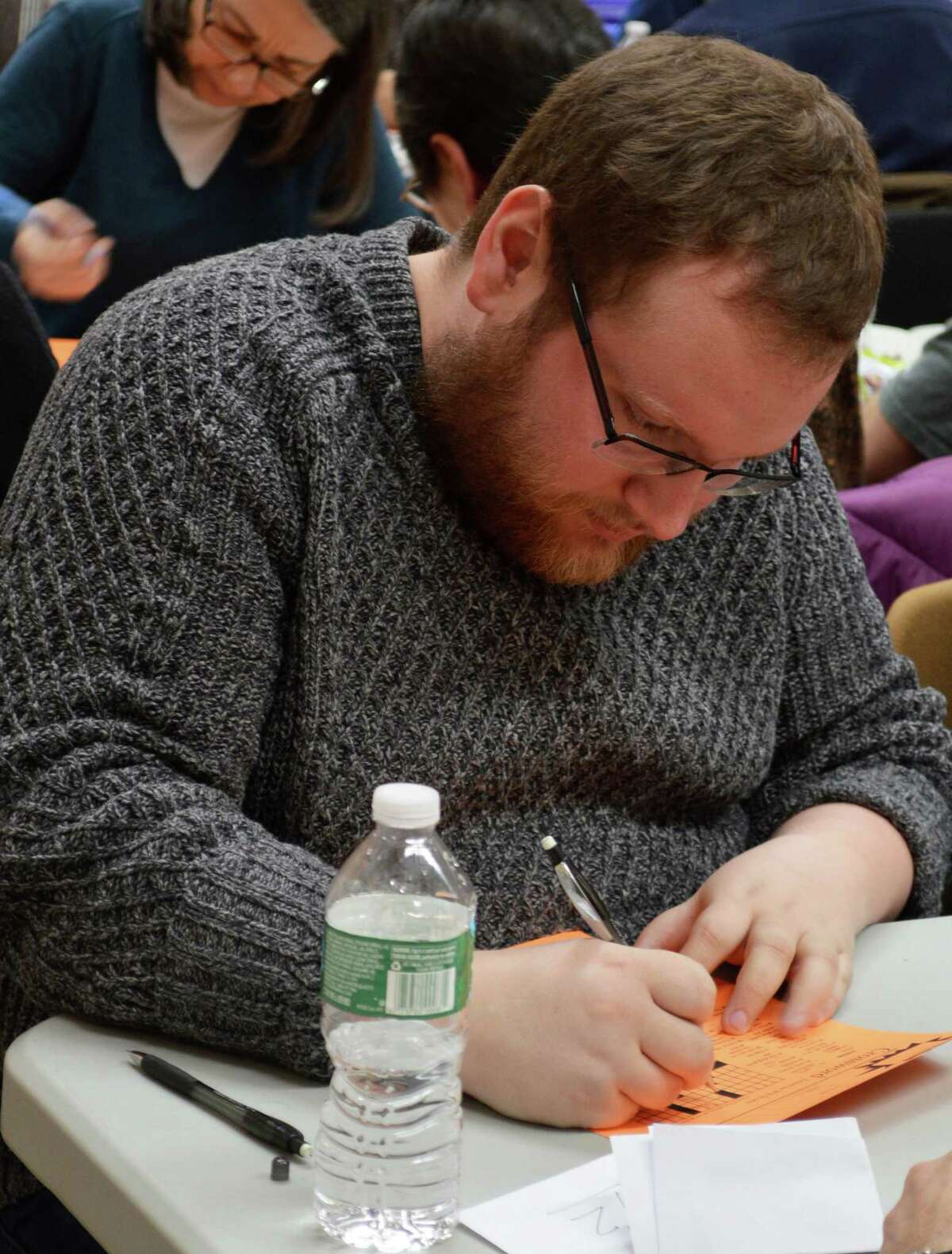 Andy Kravis of Brooklyn, N.Y., took the championship Saturday at the Westport Library's Crosswords Contest for the second year in row.