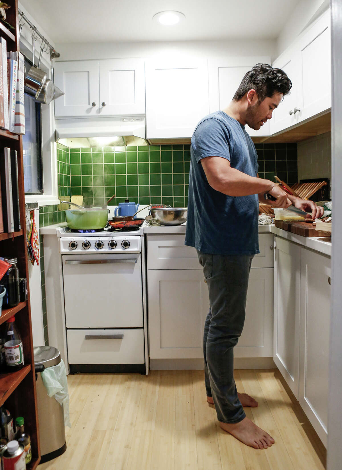 Jew in the tiny kitchen of his S.F. apartment: “I want to celebrate tradition, but I also want to make food that tastes good to me.”