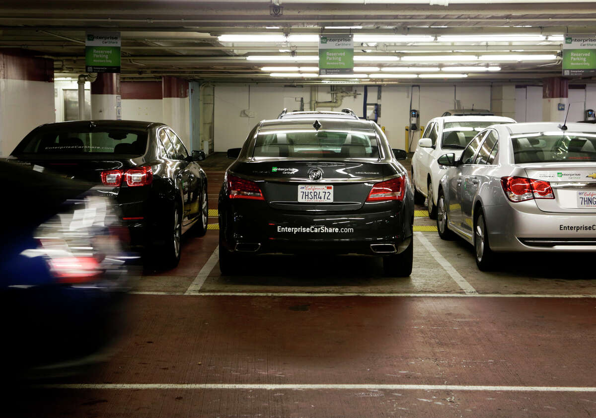 Enterprise CarShare vehicles are parked in the St. Mary’s Square Garage in San Francisco. The service began operating last week in San Francisco, where there are a number of car-share companies to choose from.
