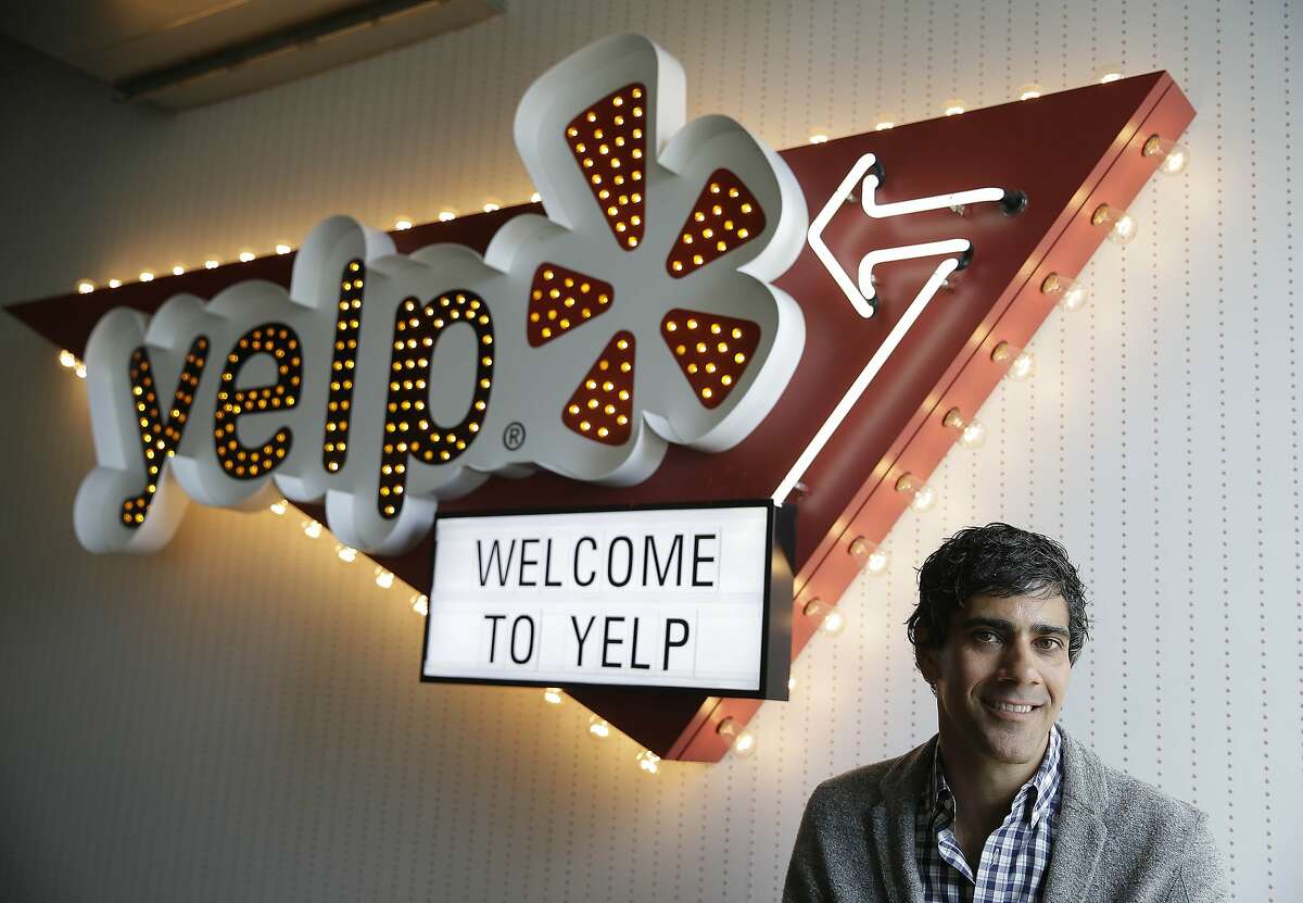 In this photo taken Friday, Aug. 1, 2014, Yelp CEO Jeremy Stoppelman poses at his company's headquarters in San Francisco. Stoppelman, 36, probably wouldn't be running Yelp Inc. if he had paid more attention to the opinions of outsiders than his own insights. (AP Photo/Eric Risberg)