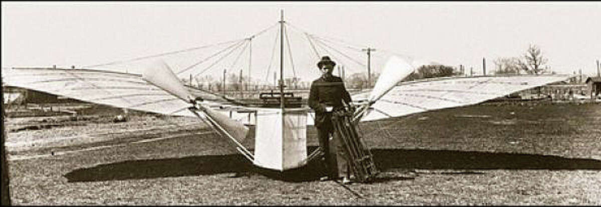 Aviation pioneer Gustave Whitehead with his No. 21 flyer that is beleived to have made the first manned flight in Fairfield in 1901.