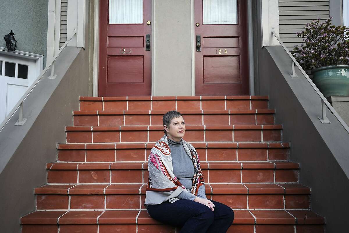 Christie White, the lead patient in a lawsuit filed against California to allow terminally ill patients to die at their own choosing with the assistance of their physicians who was also diagnosed with leukemia seven years ago, but is now in remission, poses for a portrait at her home in San Francisco, CA, on Tuesday, February 10, 2015.