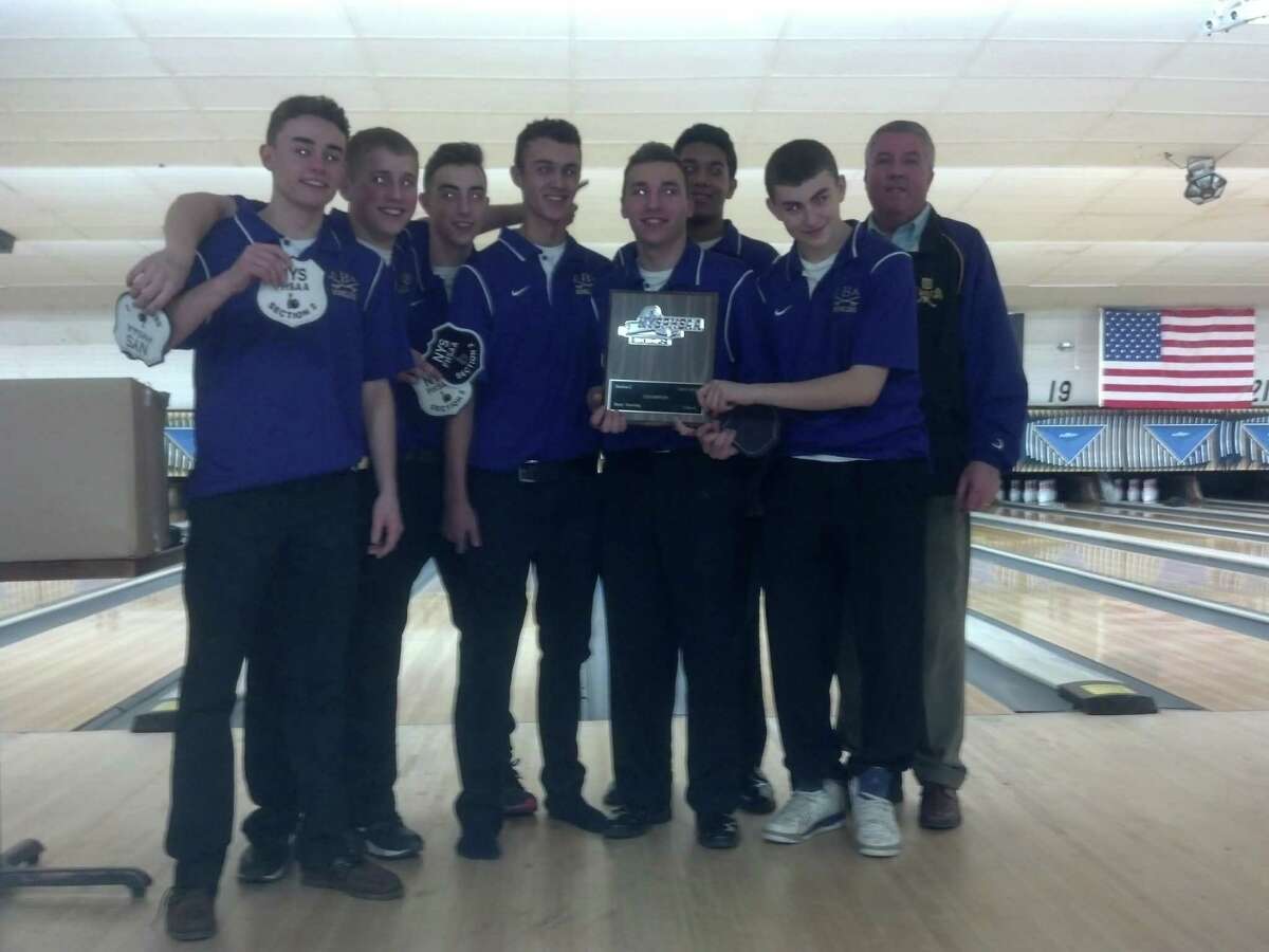 CBA bowlers celebrate their Section II championship Wednesday. (Pete Dougherty / Times Union)