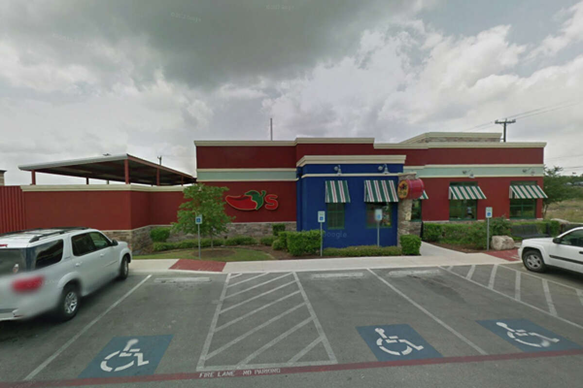 CHILI'S GRILL AND BAR: 22402 US 281 N San Antonio , TX 78259 (Village at Stone Oak) Date: 02/05/2015  Demerits: 14  8 229.163 (n) (1) eat.drink.smoke. Observed employee cell phone on shelf where clean cups are kept. Ensure employee's personal items are kept below and away from food and beverage areas.  20 229.168 (c) (1) toxics stored. Observed toxic spray bottle stored on/in hand sink. Store toxic items where they belong, away from food and other items. Ensure hand wash sink is used for hand washing only. 2 5 229.165 (q)food contact not sanitized. Observed knive stored between lid and top of cold hold unit. Ensure knives are clean/sanitized routinely and are stored properly when not in use.  25 229.165 (q)food contact not sanitized. Observed dirty salsa bowls and plates stored with clean dishware. Clean/sanitize food contact surfaces correctly before storing.  11 229.164 (e) (1) (D) (ii)Bare hand documentation. No documentation is maintained at the food establishment that food employees contacting ready-to-eat foods with bare hands utilize two or more of the following control measures to provide additional safeguards to hazards associated with bare hand contact.