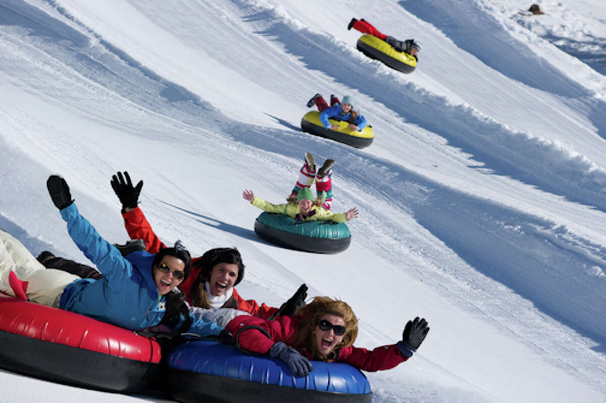 Tubers enjoy a slide down Heavenly Mountain Resort at Lake Tahoe.