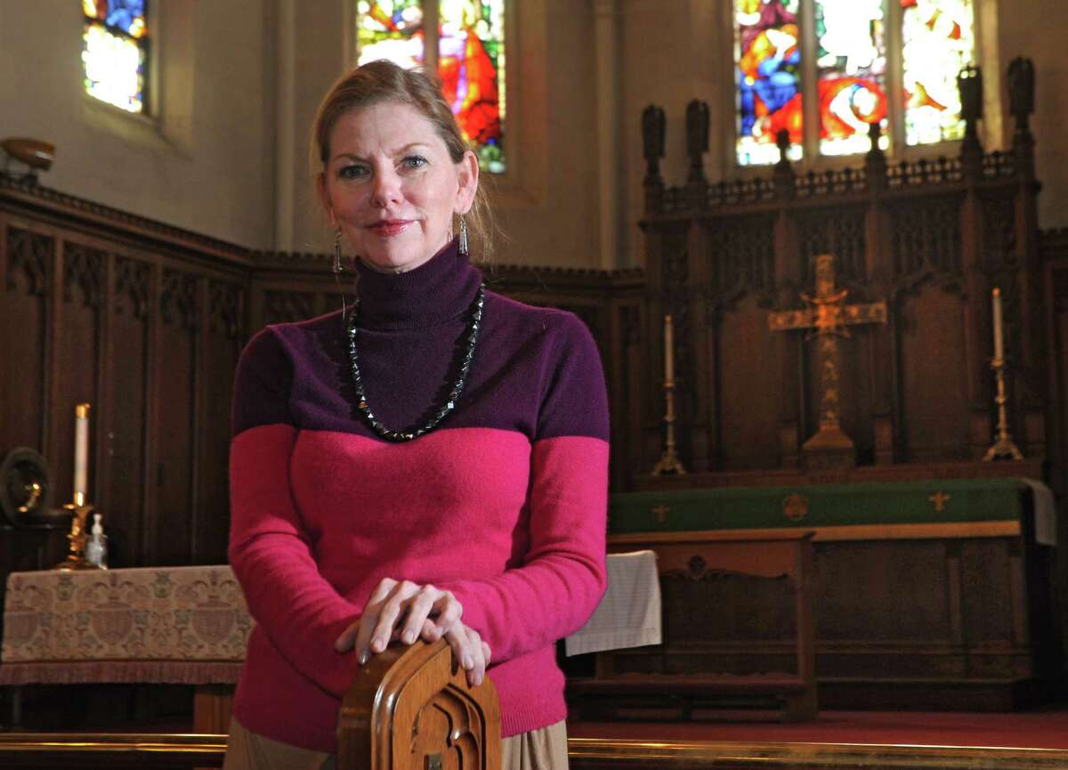 Rev. Jo Page stands in the sanctuary at St. John's Lutheran Church on Tuesday, Feb. 10, 2015 in Albany, N.Y. (Lori Van Buren / Times Union)