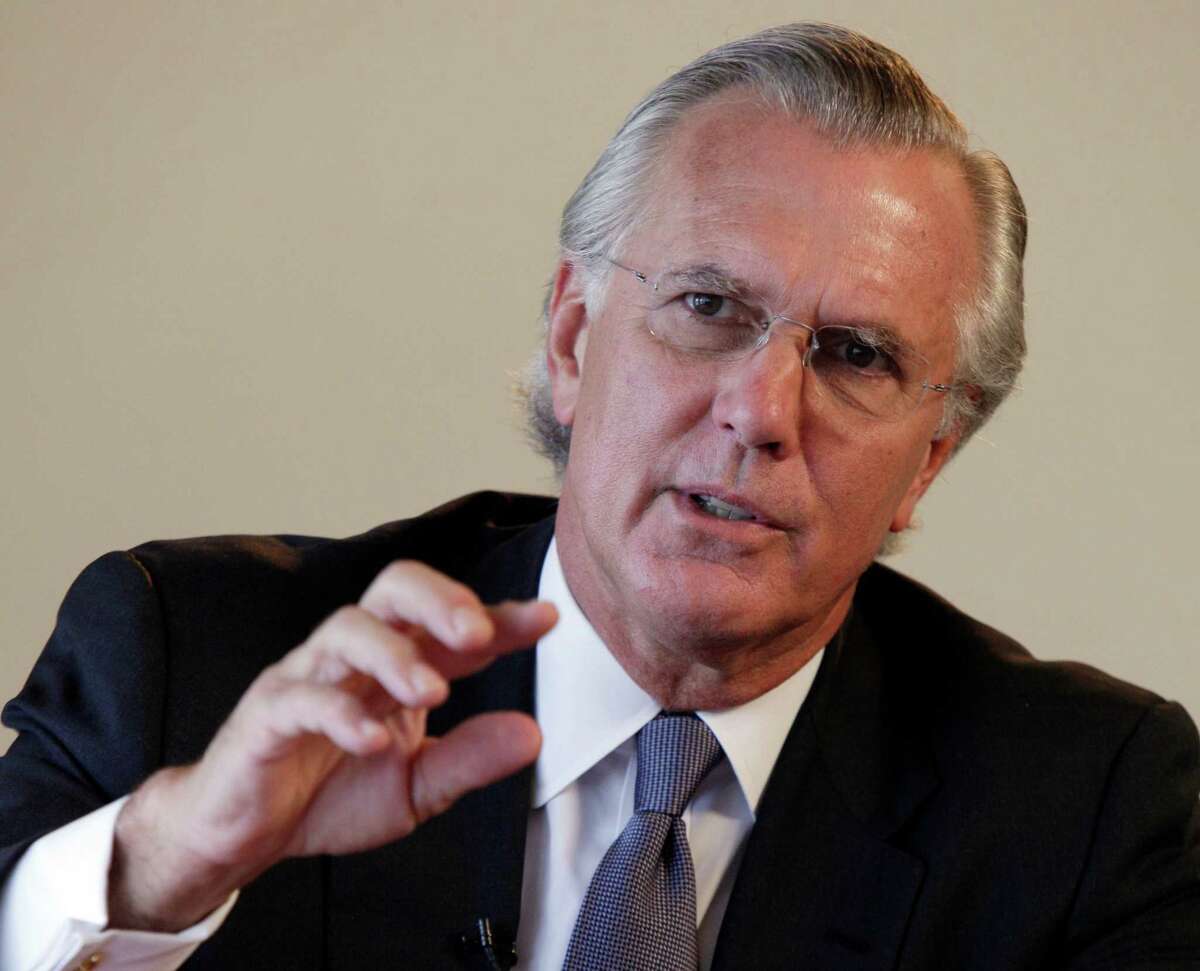 Dallas Federal Reserve Chief Richard Fisher says the Fed doesn't expect low crude prices to put Texas into recession. (AP Photo/Richard Drew)