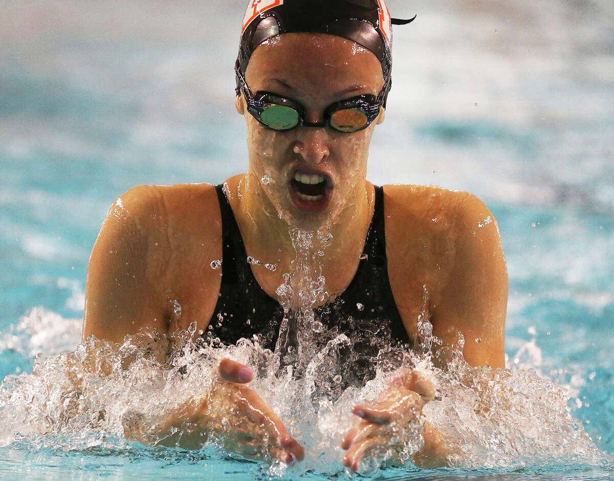 TMI swimmer Elizabeth Holmes powers her way to a second in the 200 yard IM during the TAPPS Division II state championships at the Josh Davis Natatorium on February 13, 2015