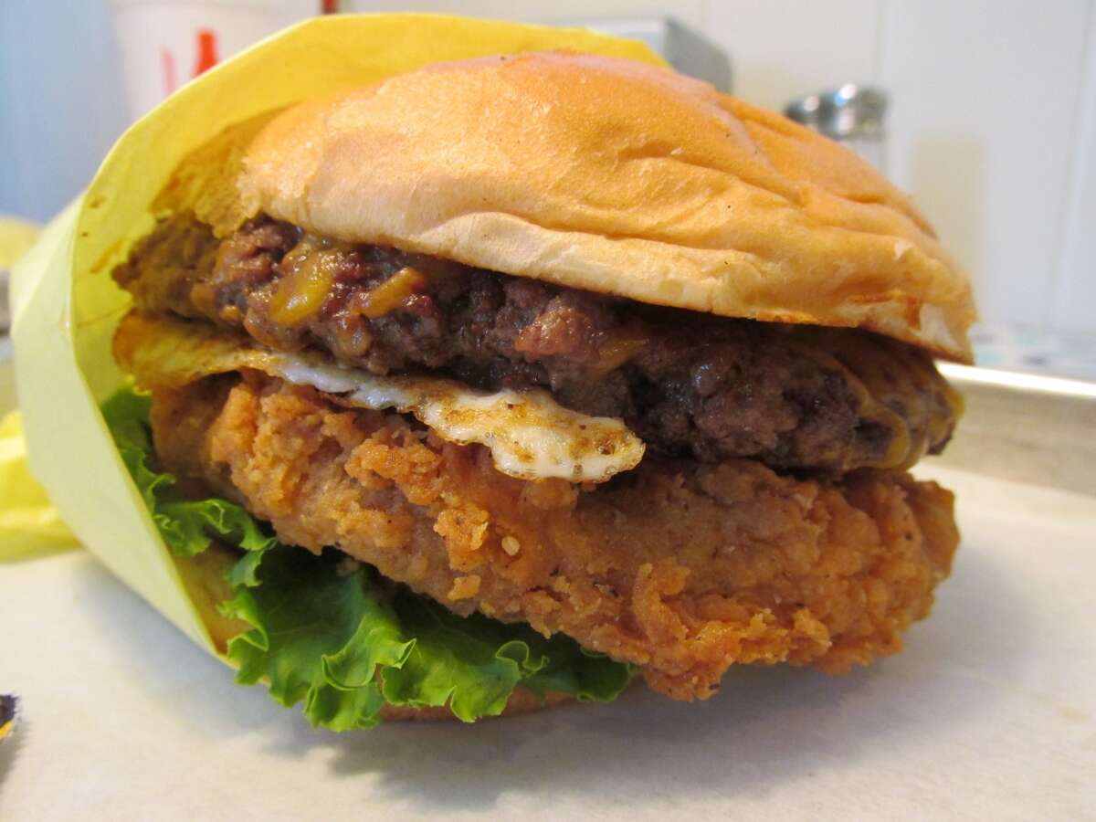 The Booty Burger at Willy Burger in Beaumont is made with fried boudain, beef, Creole mustard, lettuce and tomato.