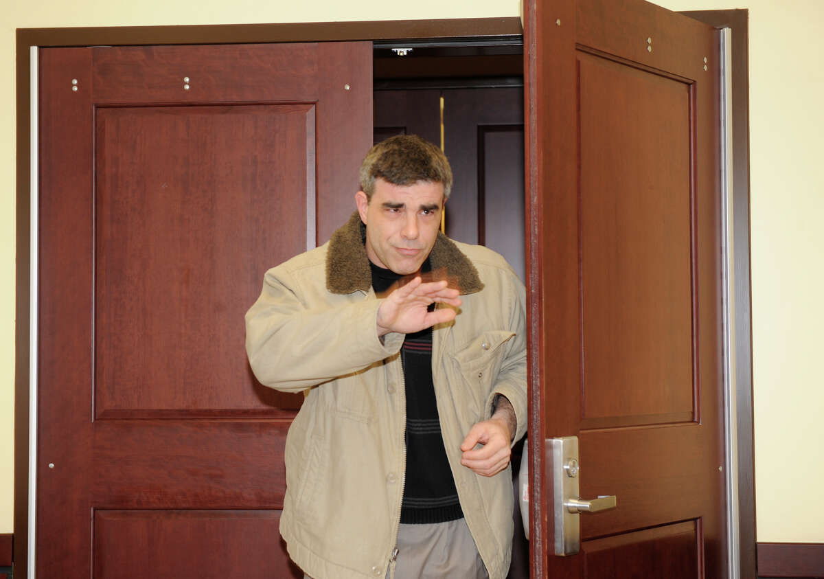 In this photo from 2010, Joseph Speranza leaves Albany County Court after appearing in front of Judge Stephen Herrickon on a prostitution charge for running a sex service out of his Colonie home. On Feb. 12, 2015, he was charged with grand larceny for not doing $11,000 of construction work in 2010. (Skip Dickstein/Times Union)