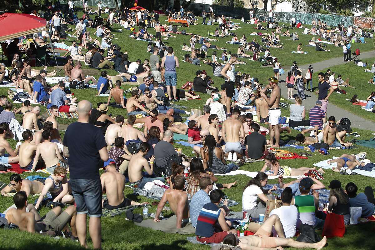 Hundreds of people flocked to Dolores Park in San Francisco, Calif. Sunday, February 15, 2015 to enjoy the rare, warm February weather.