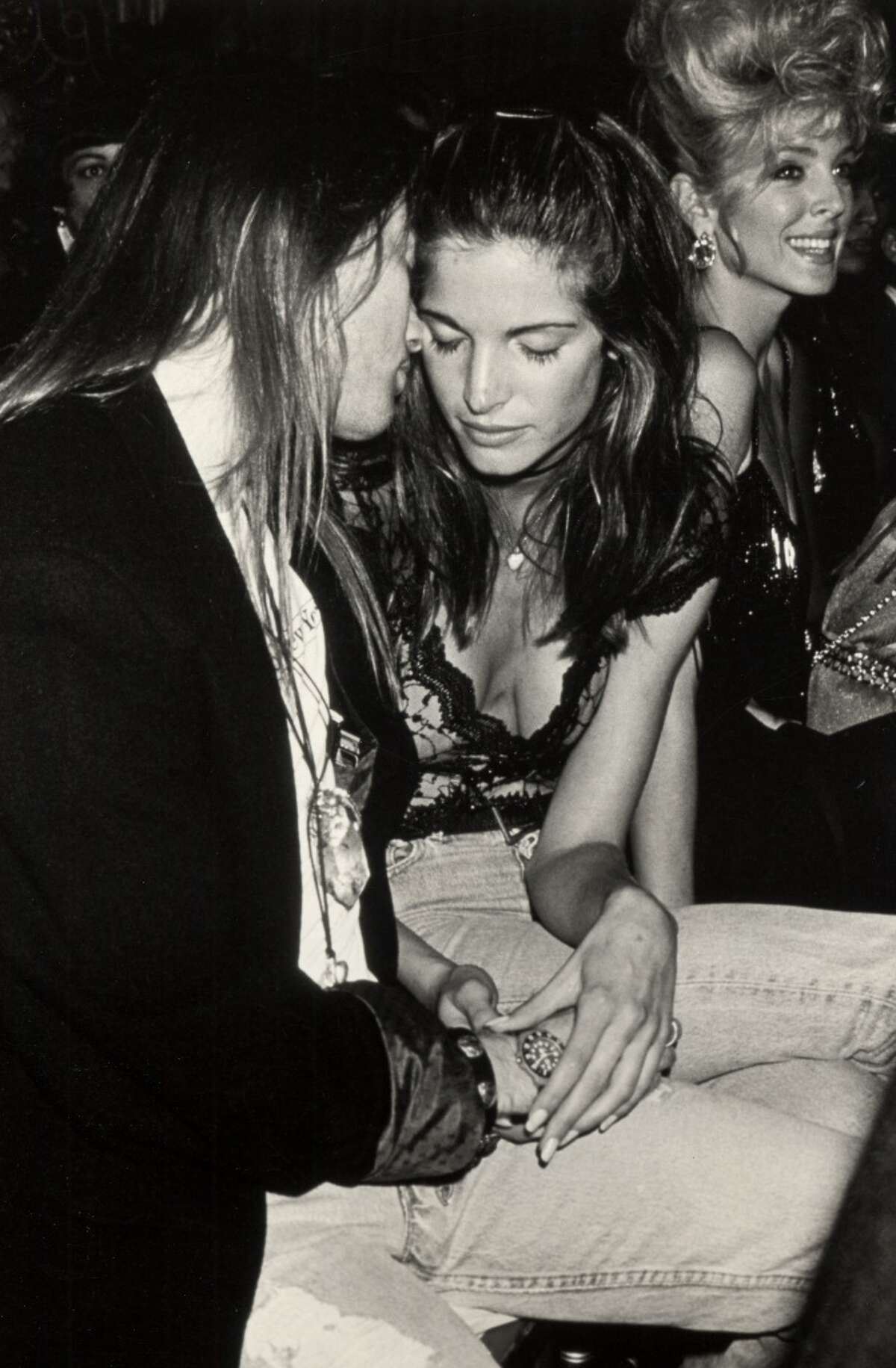 Stephanie Seymour, seen here in 1991 at age 23 with then-boyfriend Axl Rose, appeared in many Sports Illustrated Swimsuit issues, Victoria's Secret catalogues and posed for Playboy.