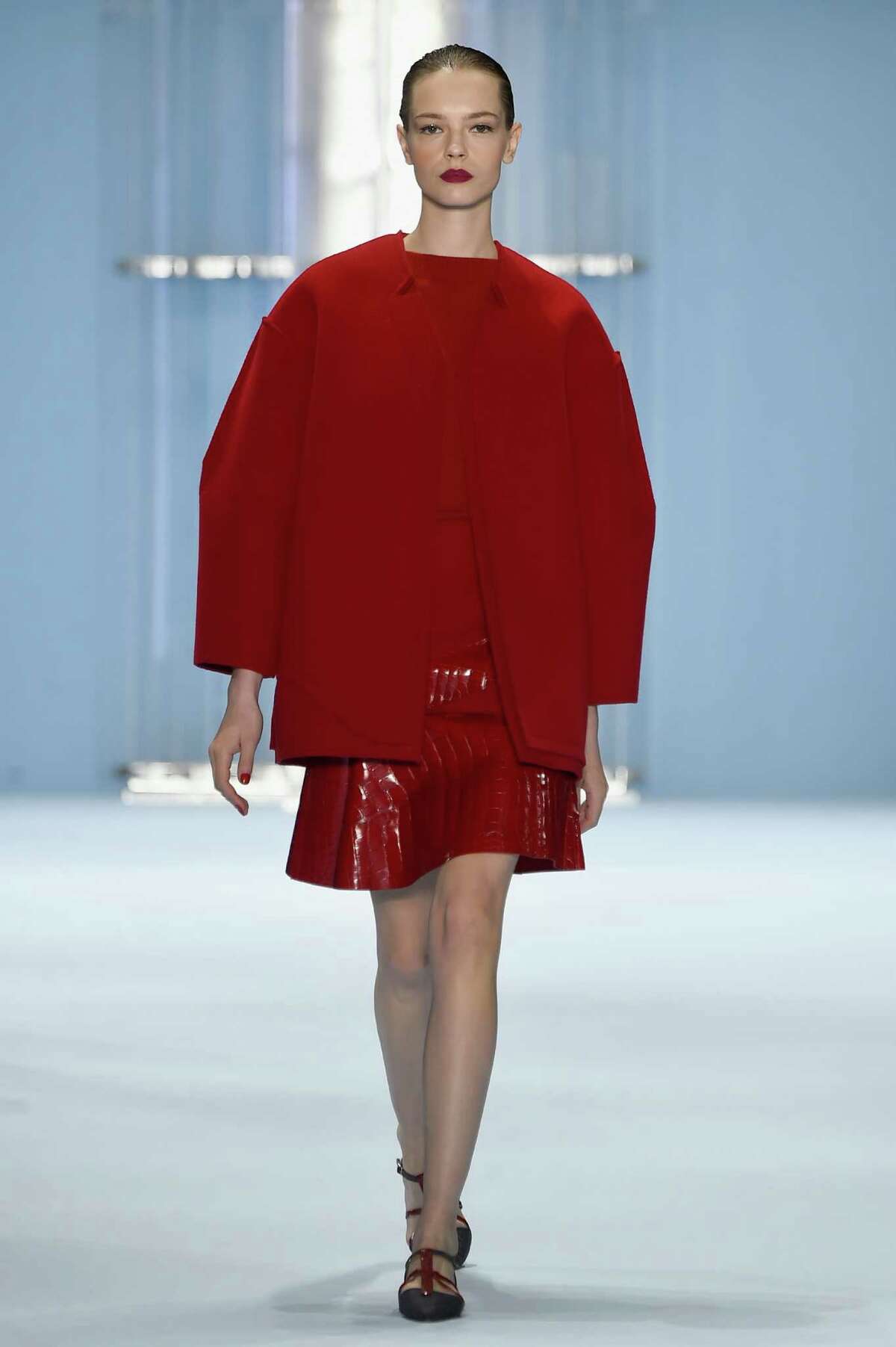 Carolina Herrera incorporated vibrant red in her fall 2015 collection shown during Mercedes-Benz Fashion Week. Her silhouettes included coats that were less boxy but still ample enough to layer with.