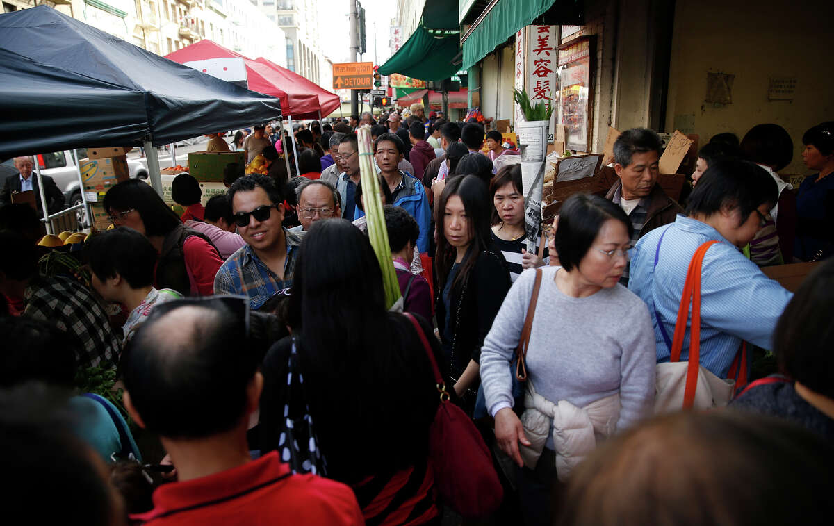 The sidewalks are crowded and hard to navigate on Stockton Street, which is the main shopping area for locals in Chinatown.