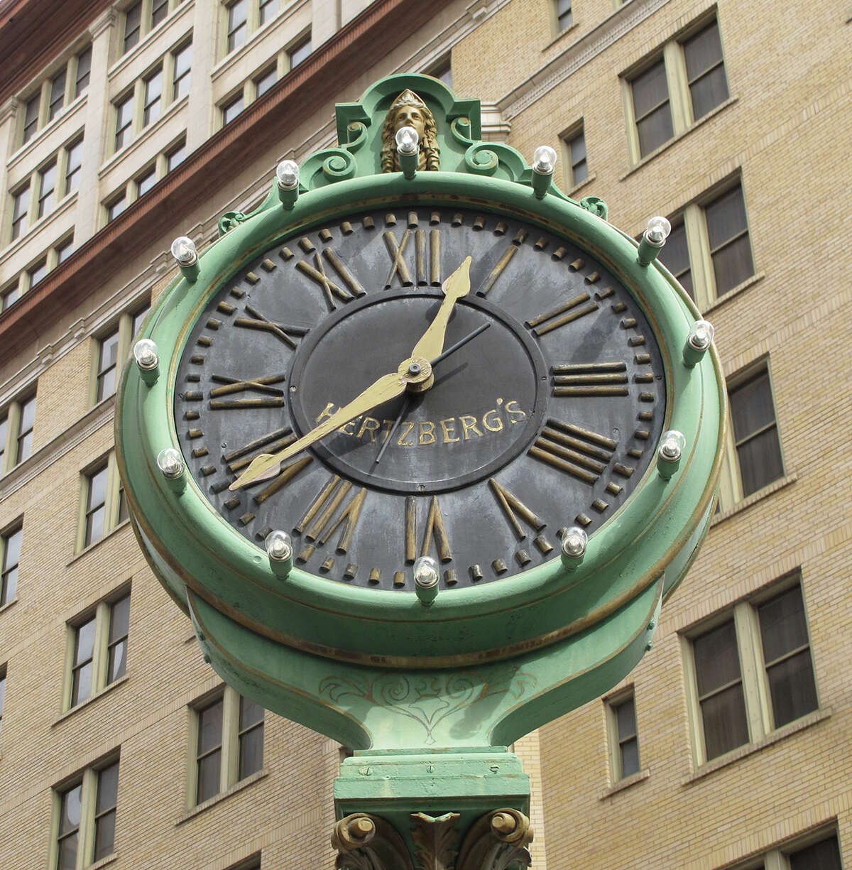 The Hertzberg Clock stands at the corner of Houston and St. Mary's streets. In 1878, Eli Hertzberg installed the clock outside his jewelry shop on Commerce Street. When the shop moved to Houston and St. Mary's streets in 1910, the clock followed.