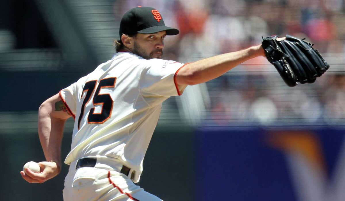 San Francisco Giants starting pitcher Barry Zito throws to the Miami Marlins in the first inning of their MLB baseball game Saturday, June 22, 2013, in San Francisco, Calif.