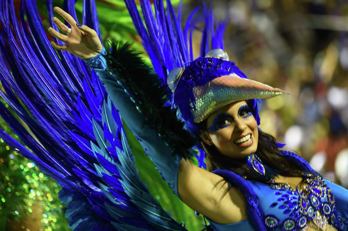Revelers of the Portela samba school perform during the second night of carnival parade at the Sambodrome in Rio de Janeiro, Brazil on Feb. 16, 2015.
