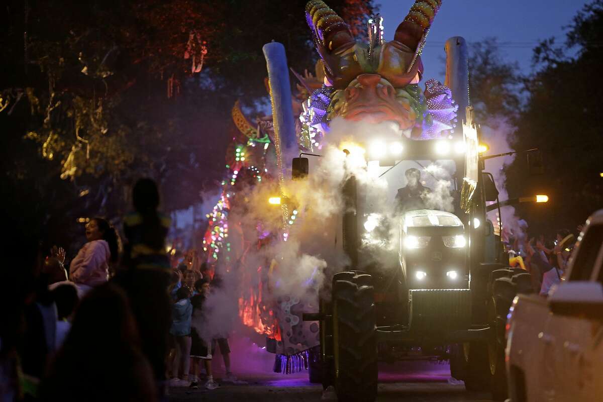 A float in the Krewe of Proteus passes down Napoleon Avenue during their Mardi Gras parade in New Orleans, Monday, Feb. 16, 2015. The day is known as Lundi Gras, the day before Mardi Gras. (AP Photo/Gerald Herbert)