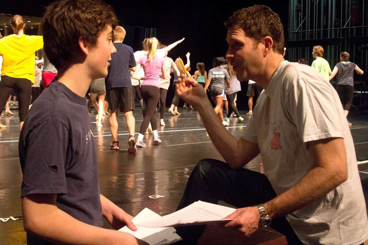 Ty Doran, who plays the role of director in "A Chorus Line" at The Kinkaid School, listens to his father Justin, who is director of the musical. Ty, 15, is a junior at Kinkaid. "A Chorus Line" will be presented Feb. 26-27, March 1 at The Katz Performing Arts Center. Ty Doran, who plays the role of director in "A Chorus Line" at The Kinkaid School, listens to his father Justin, who is director of the musical. Ty, 15, is a junior at Kinkaid. "A Chorus Line" will be presented Feb. 26-27, March 1 at The Katz Performing Arts Center.