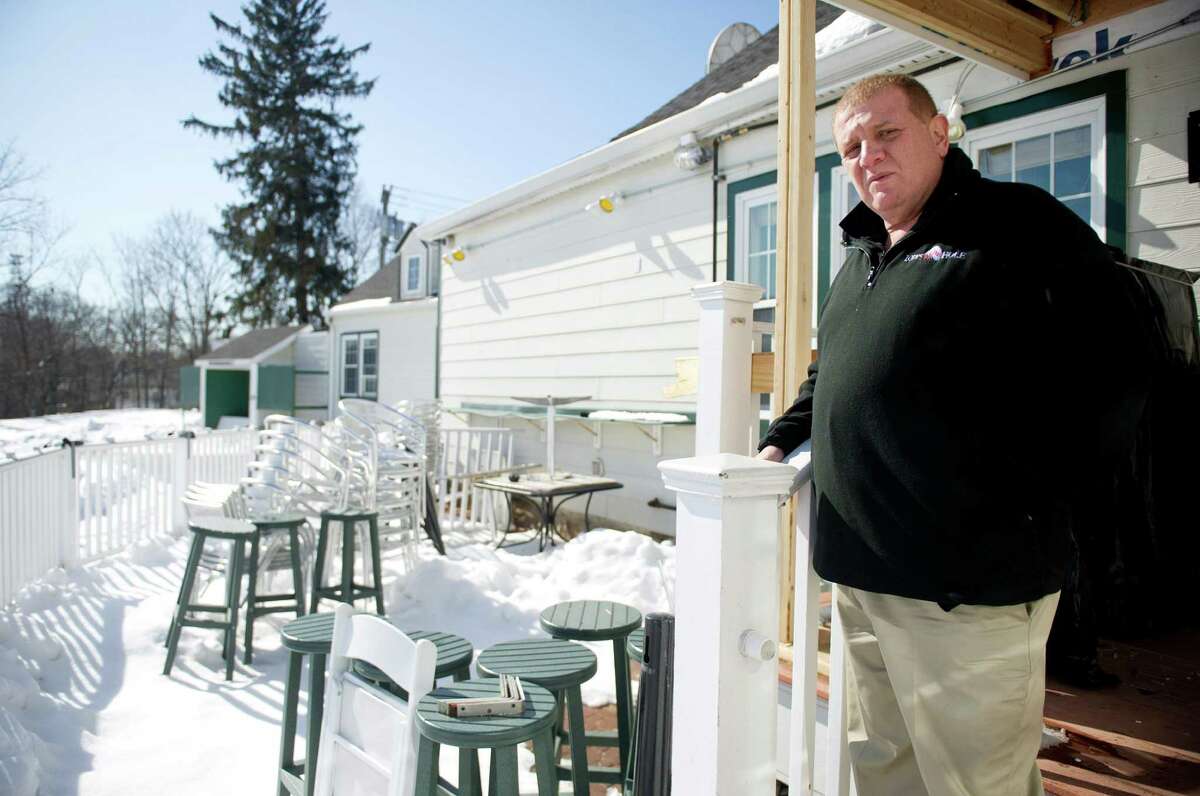 Mike Zohdy, owner of Zody's 19th Hole, describes his plans for adding a counter with stools on the outdoor deck behind the restaurant on Tuesday, February 17, 2015. Zody's has signed a new 15-year lease.