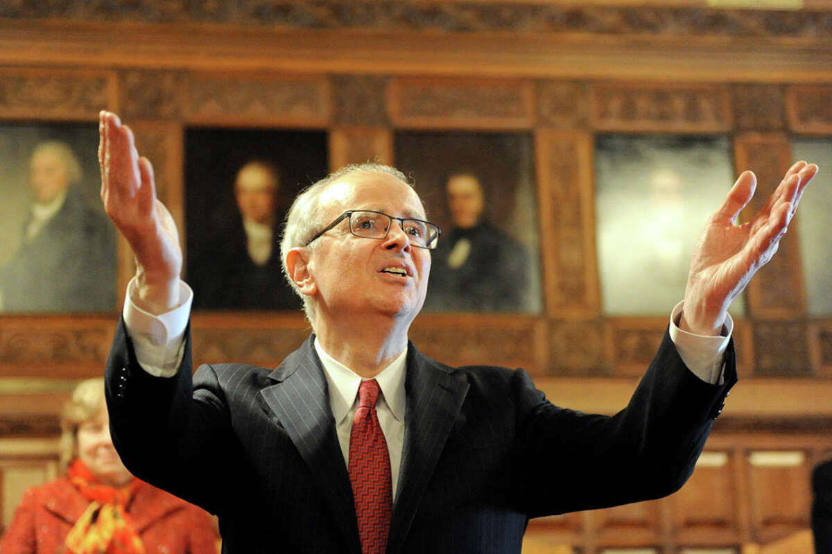 Chief Judge Jonathan Lippman, center, takes in the applause after delivering the State of the Judiciary on Tuesday, Feb. 17, 2015, at the Court of Appeals in Albany, N.Y. (Cindy Schultz / Times Union)