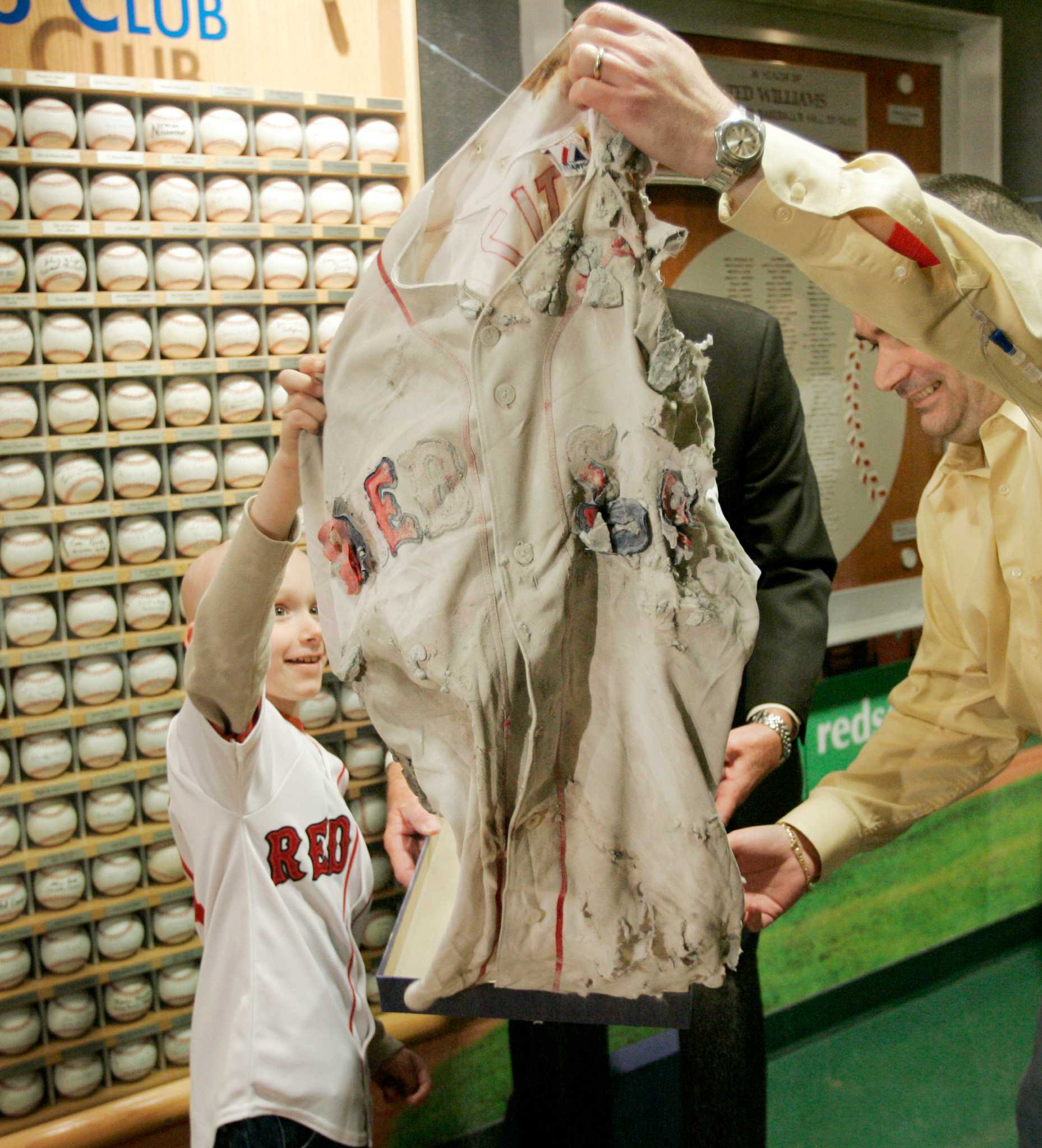 Local fan pays $175,000 for buried Sox jersey