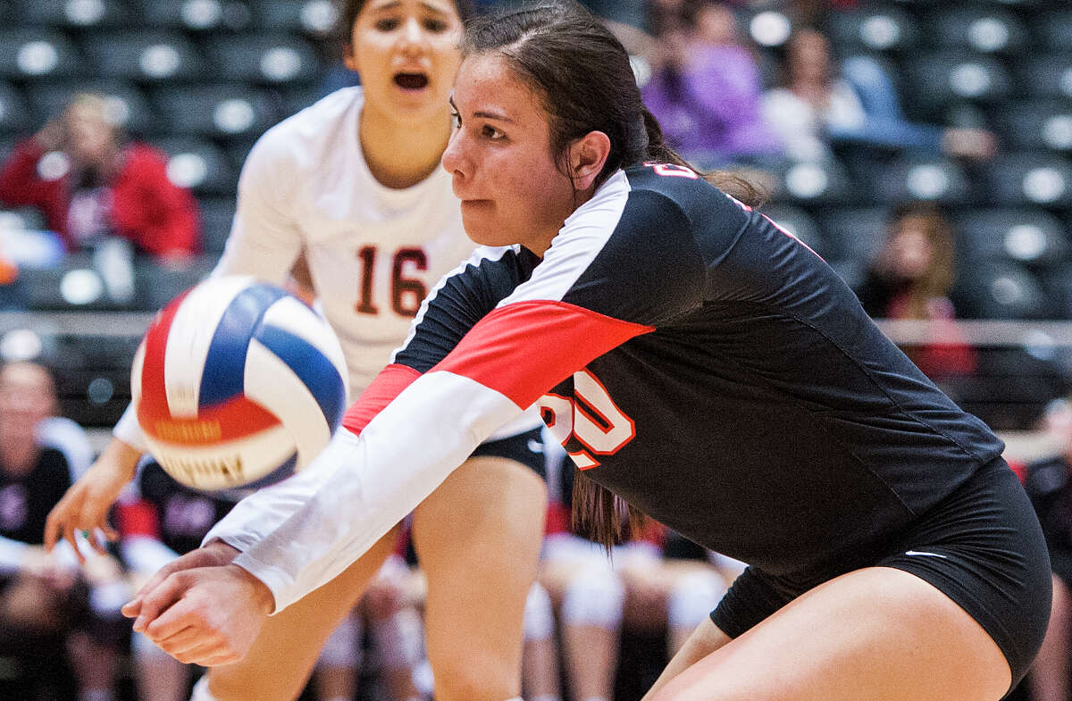 Churchill’s Hannah Lopez looks to pass during a Class 6A state semifinal volleyball match against Conroe The Woodlands on Nov. 21, 2014 at the Cullwell Center in Garland.