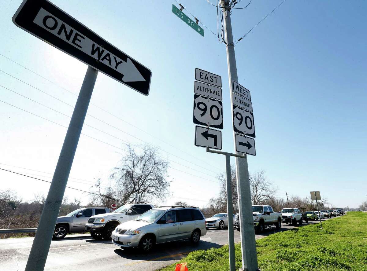Drivers line up to make a left turn from U.S. 90A east bound at the intersection of FM 359 and U.S. 90A, Monday, Feb. 9, 2015, in Richmond, where TxDOT is planning an elevated intersection over the train tracks.