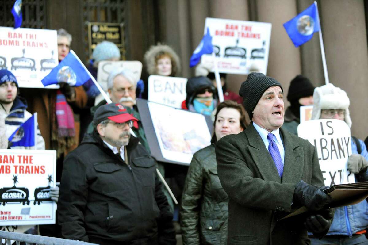 Chris Amato, attorney for Earth Justice, second from right, calls for the Common Council to support an oil train ban on Thursday, Feb. 19, 2015, at City Hall in Albany, N.Y. (Cindy Schultz / Times Union)