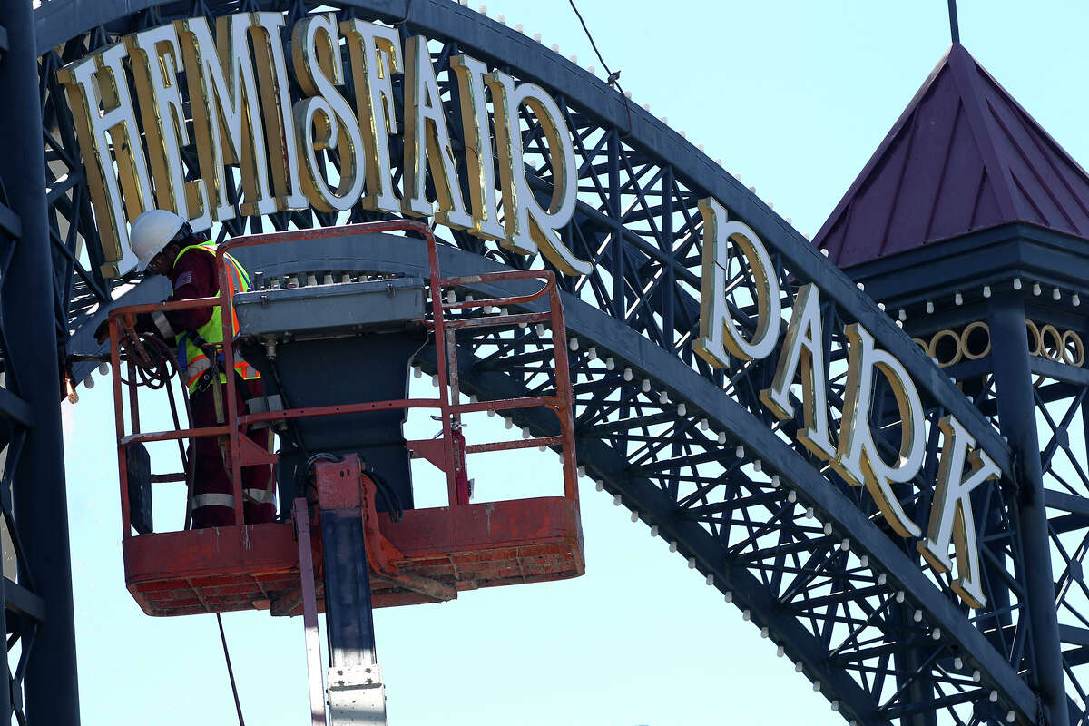 The sign for HemisFair Park in downtown San Antonio was dismantled this week, but it will be placed in storage while its fate is discussed.﻿