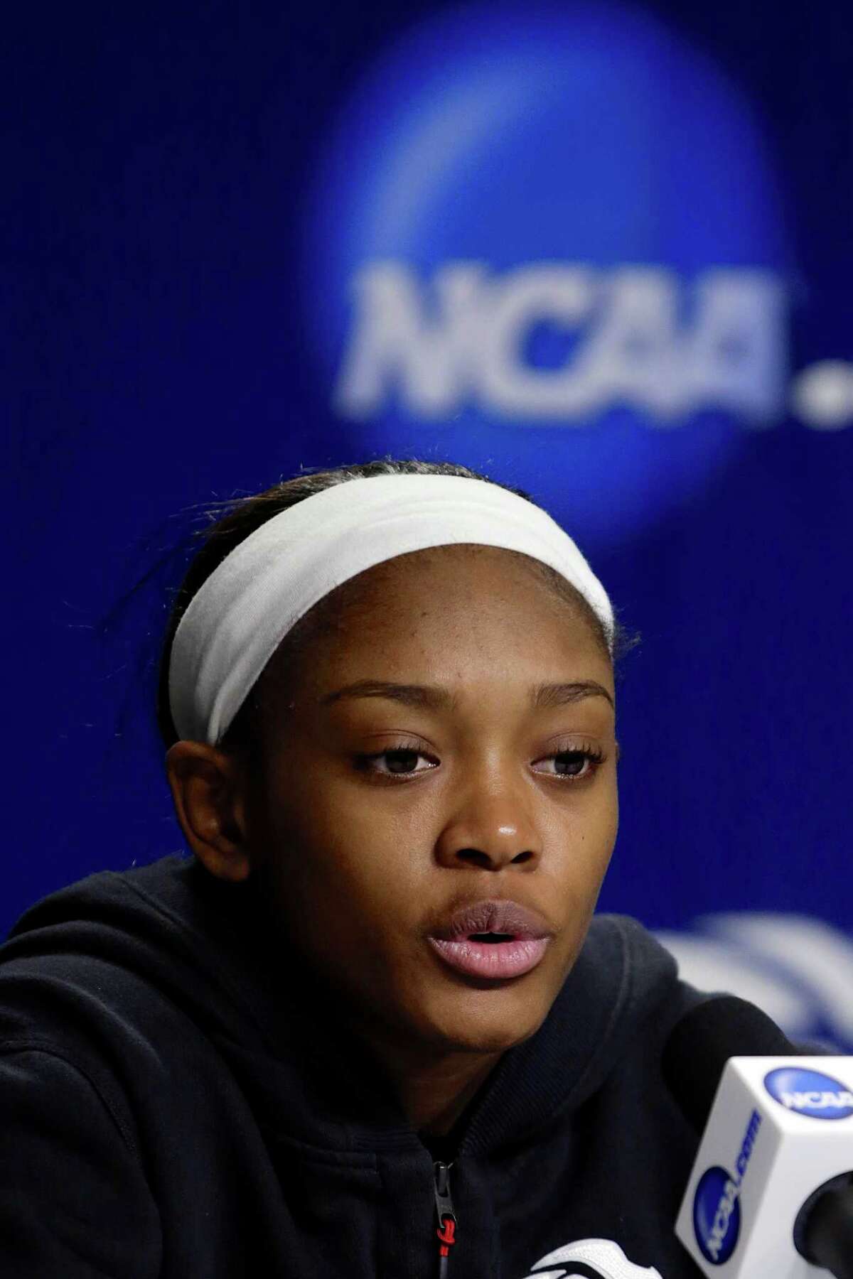Texas A&M's Courtney Walker speaks during a news conference, Sunday, March 30, 2014, ahead of a regional finals game in the NCAA women's college basketball tournament in Lincoln, Neb. Texas A&M will play Connecticut in the finals on Monday. (AP Photo/Nati Harnik)