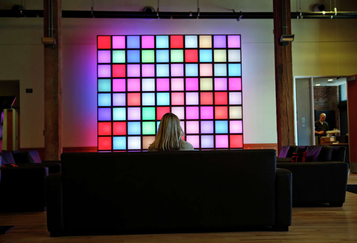 Adobe’s workers in its San Francisco offices Adobe headquarters' lobby in the famous Baker & Hamilton building in the SoMa district of San Francisco, Calif. on Thursday, February 19, 2015.