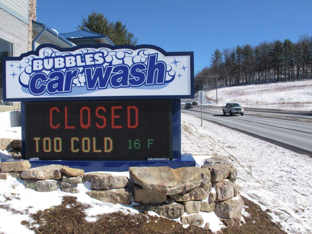 A car wash is closed due to weather conditions in Boone, N.C., on Friday, Feb. 20, 2015. Temperatures across the South and much of the country are hitting record lows. (AP Photo/Allen G. Breed)