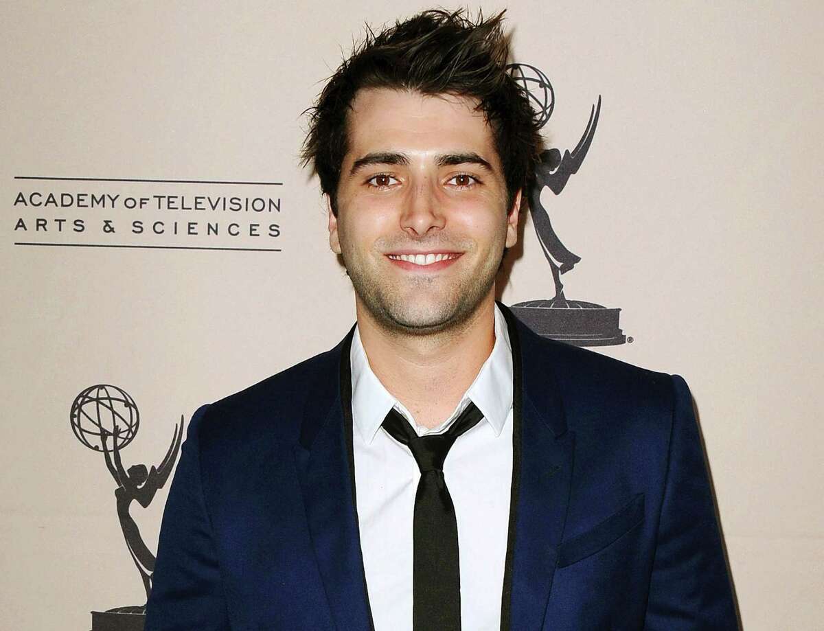 FILE - In this June 13, 2013 file photo, actor Freddie Smith arrives at the 40th Annual Daytime Emmy Awards nominee reception in Beverly Hills, Calif. Smith has been sentenced to two years of probation and had his driversâ license suspended for a year after pleading guilty to charges stemming from a car crash that seriously injured his girlfriend. (Photo by Scott Kirkland/Invision/AP, File)